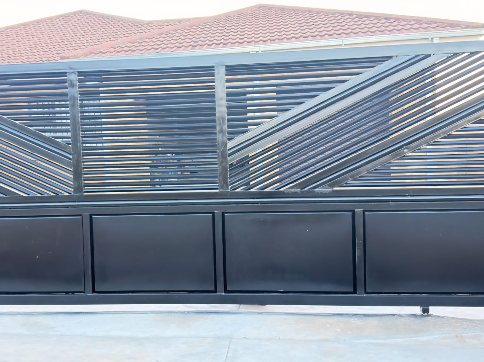 Custom aluminium sliding gate by Mondli Projects SA