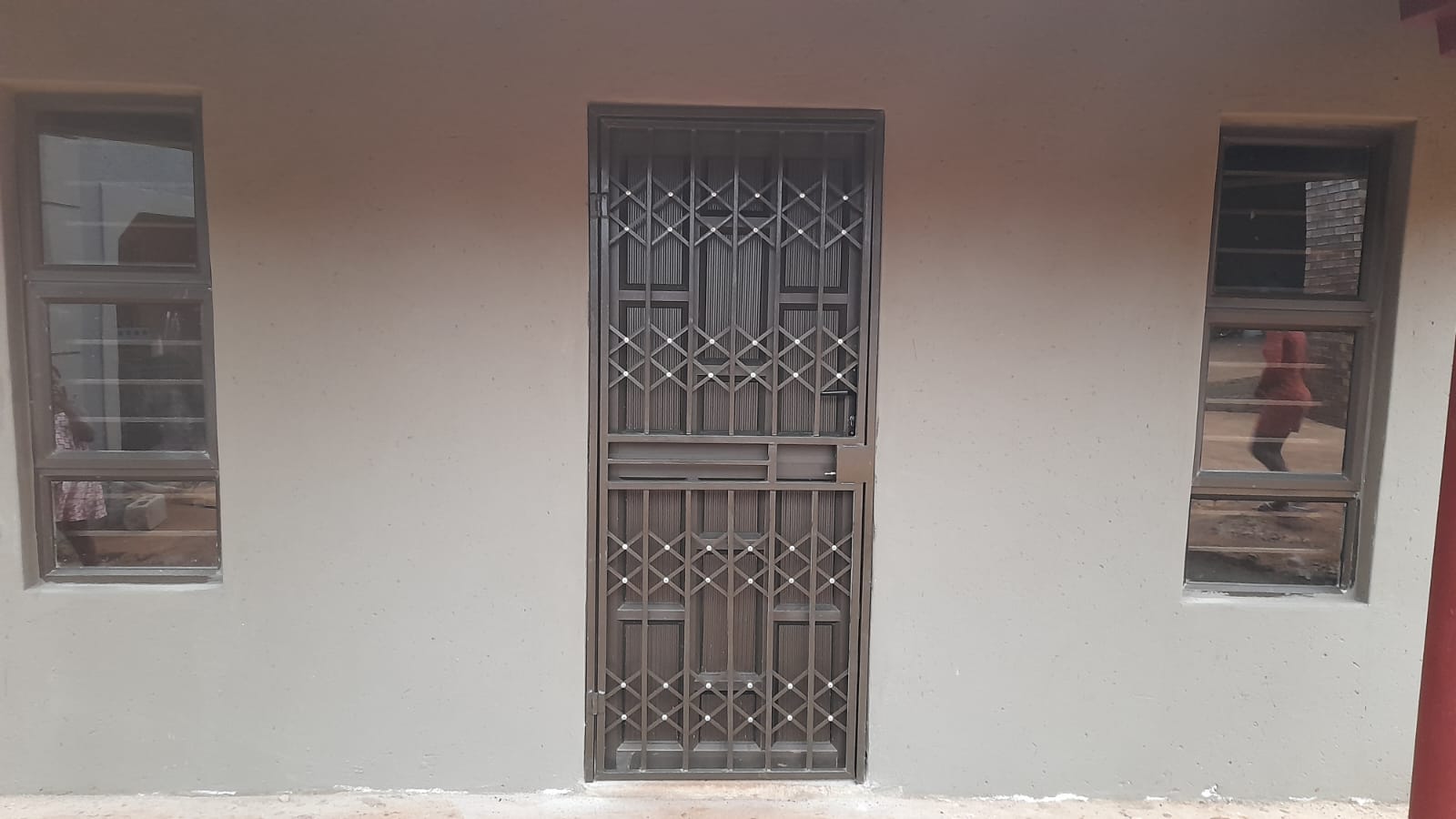 Security door with aluminium windows