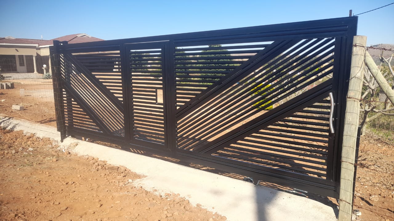Black diagonal bar sliding gate