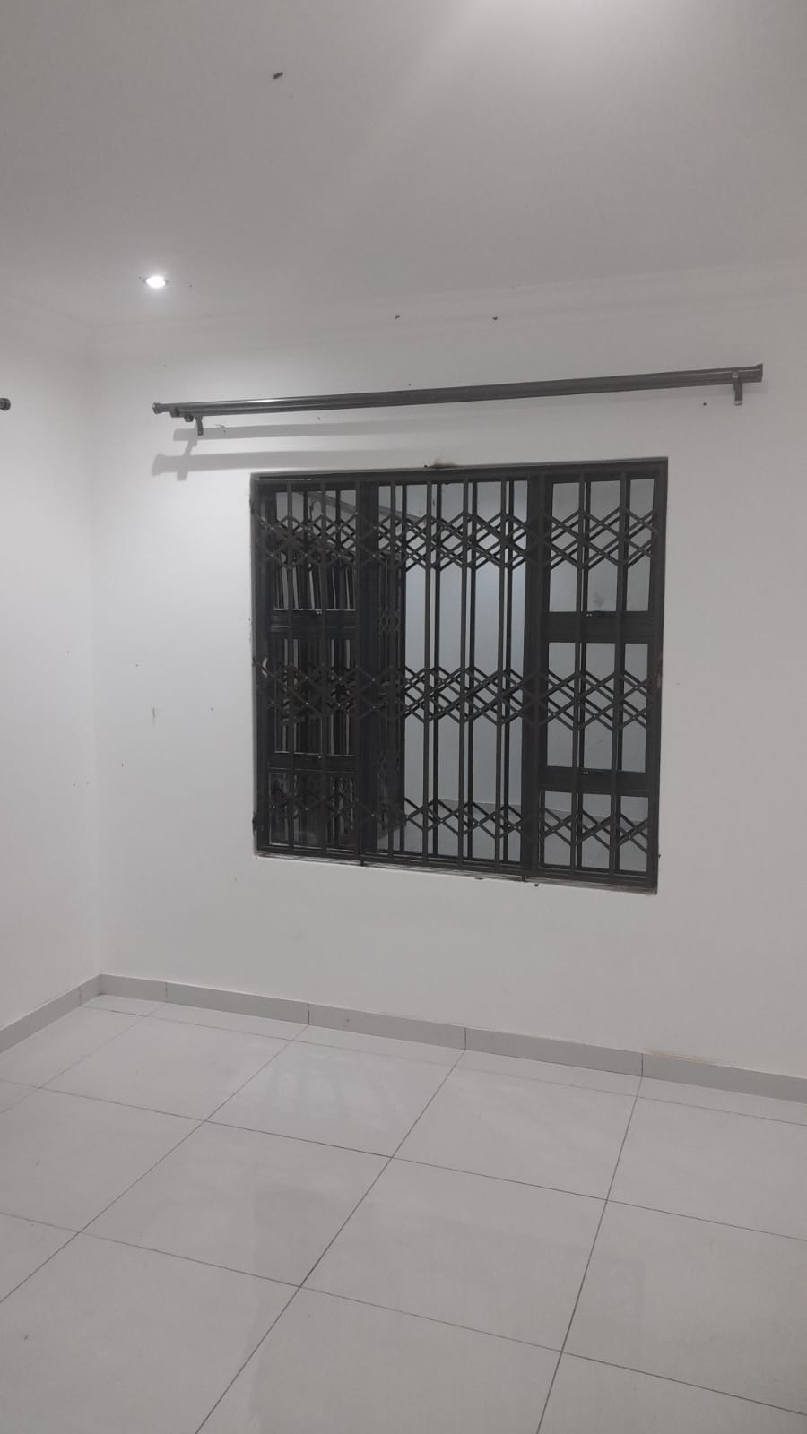 Security Trellis  Window Bars  Tiled Room